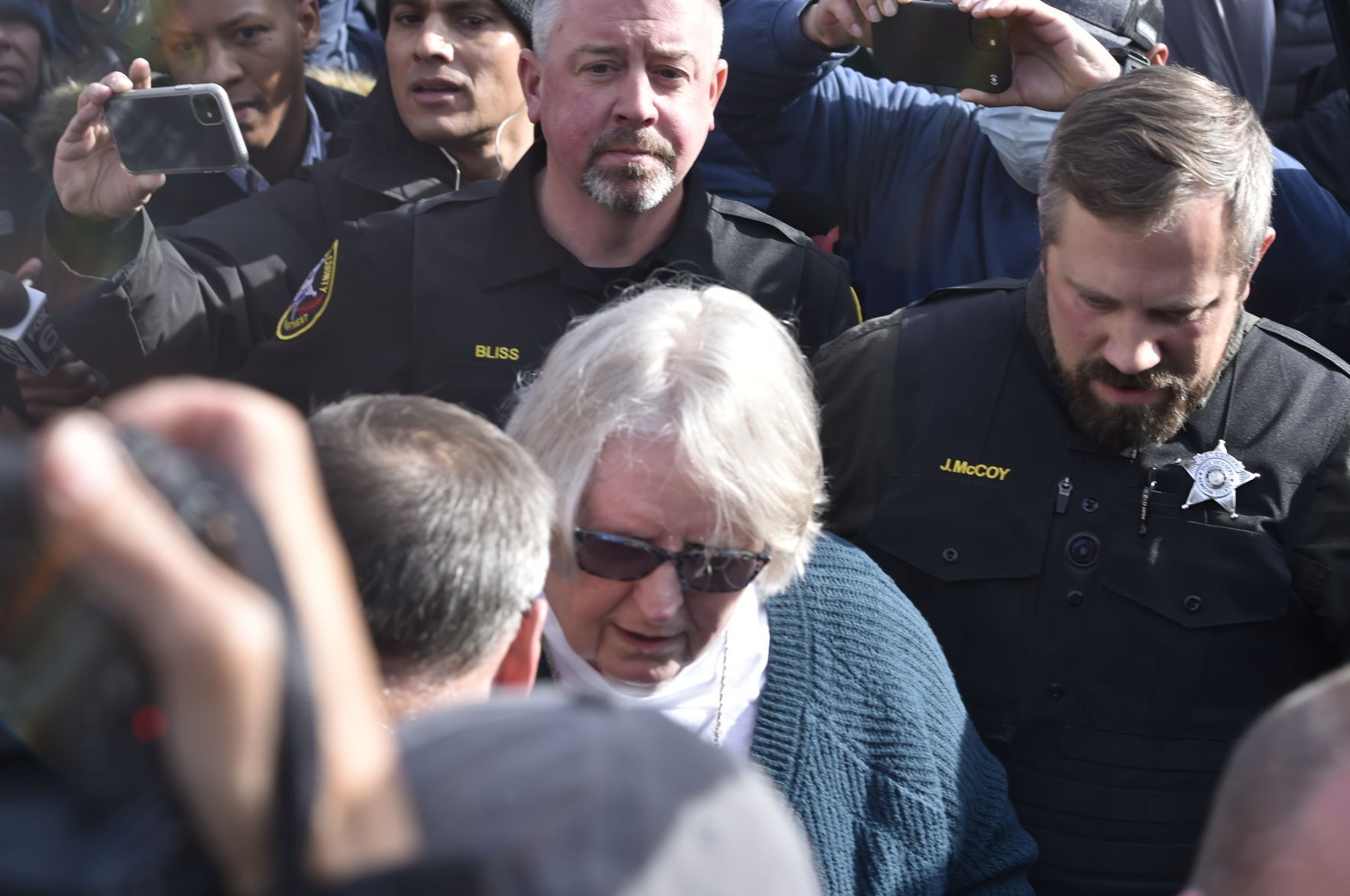 Susan Hughes escorted from Kenosha County Courthouse Friday